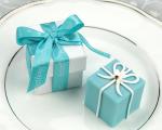 something blue gift box candle in pearlized box with satin printed ribbon